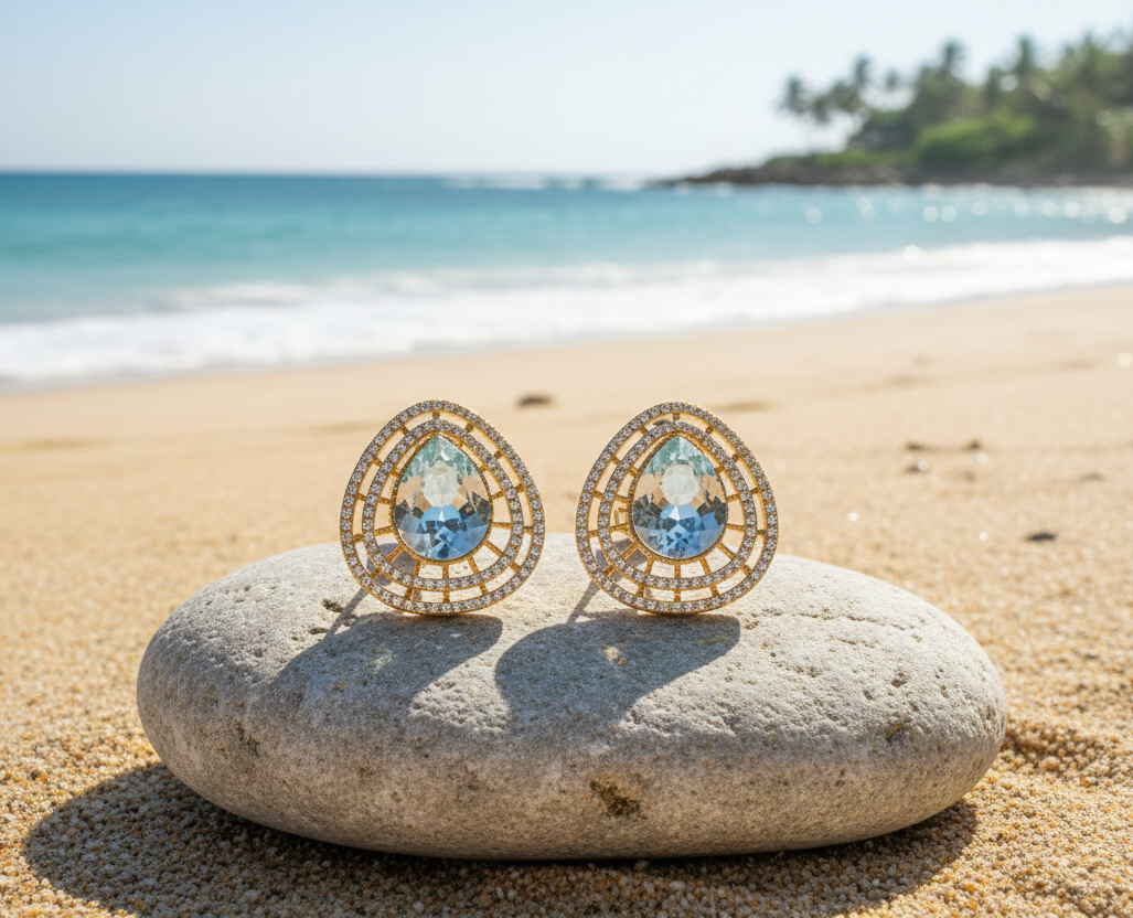 Gold-Plated Teardrop Stud Earrings with Light Blue Stone | Crystal-Embedded Designer Fashion Jewellery for Women