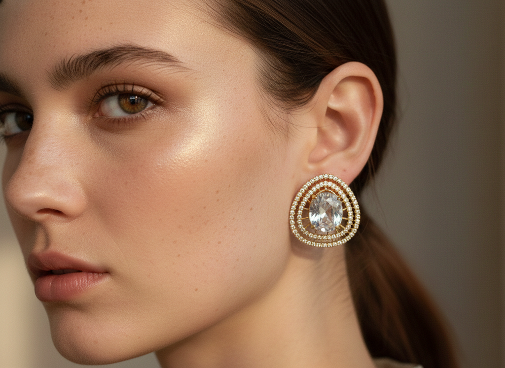 Gold-Plated Teardrop Stud Earrings with Light Blue Stone | Crystal-Embedded Designer Fashion Jewellery for Women